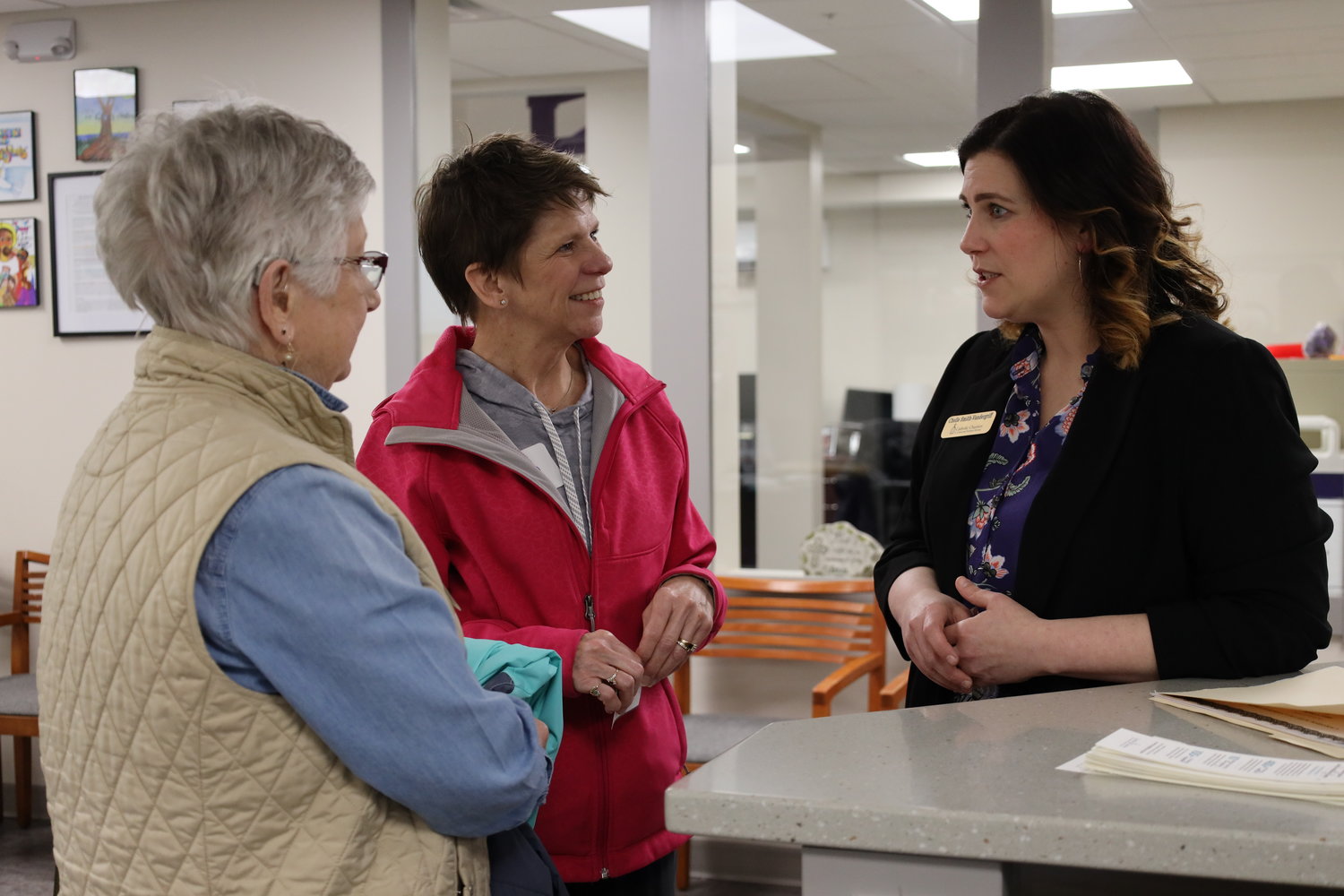 Sr. Director of Volunteer Engagement, Chelle Smith-Vandergriff gives tours to community members and shares information about volunteer opportunities at the Central Office and in the Catholic Charities Food Pantry.